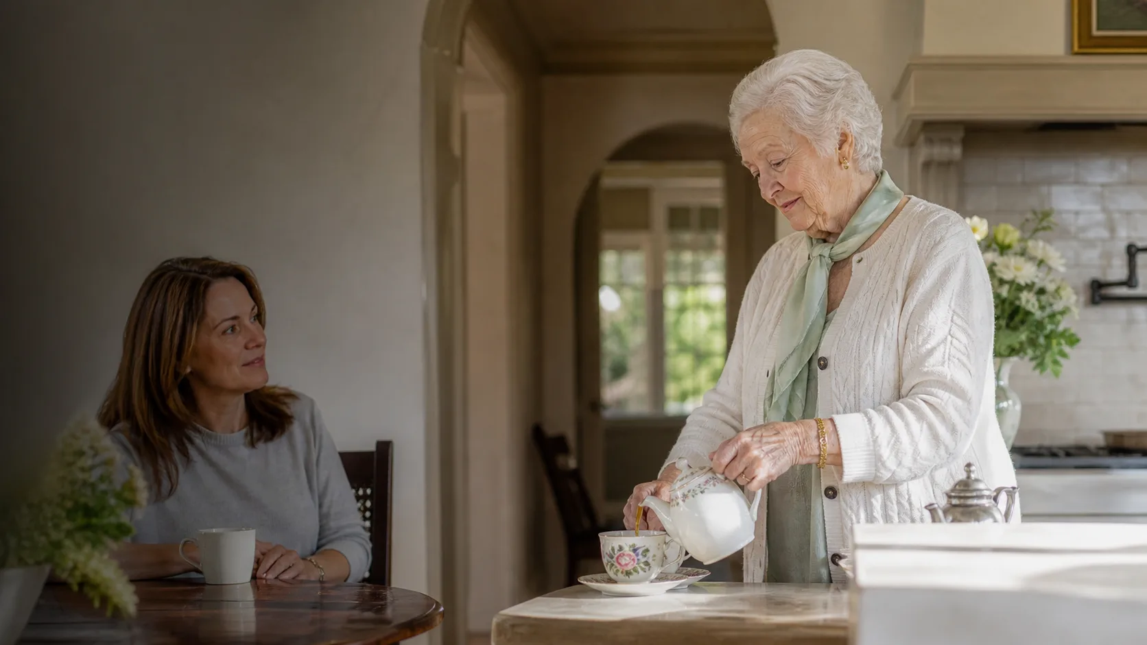 An older adult receiving patient help with a phone